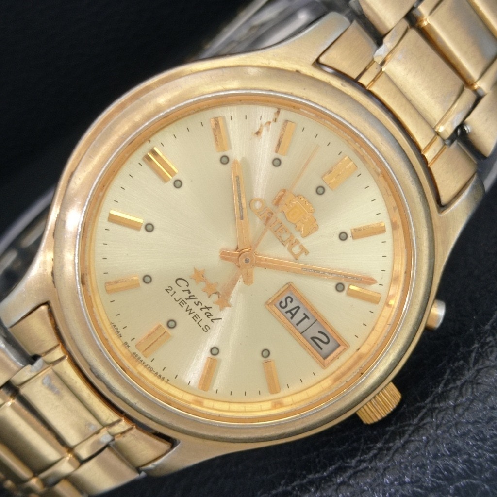 Vintage 1983 Orient Automatic Mens Gold Watch WDaydate  Gold Accents